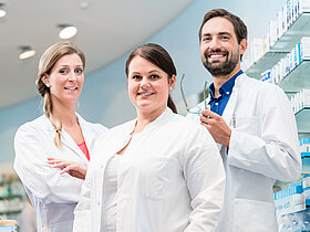 Team of apothecaries in pharmacy