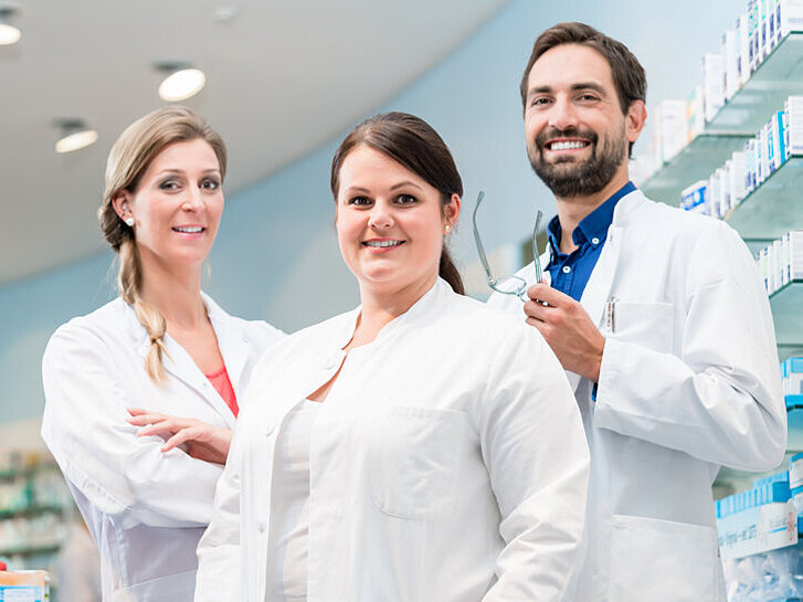Team of apothecaries in pharmacy
